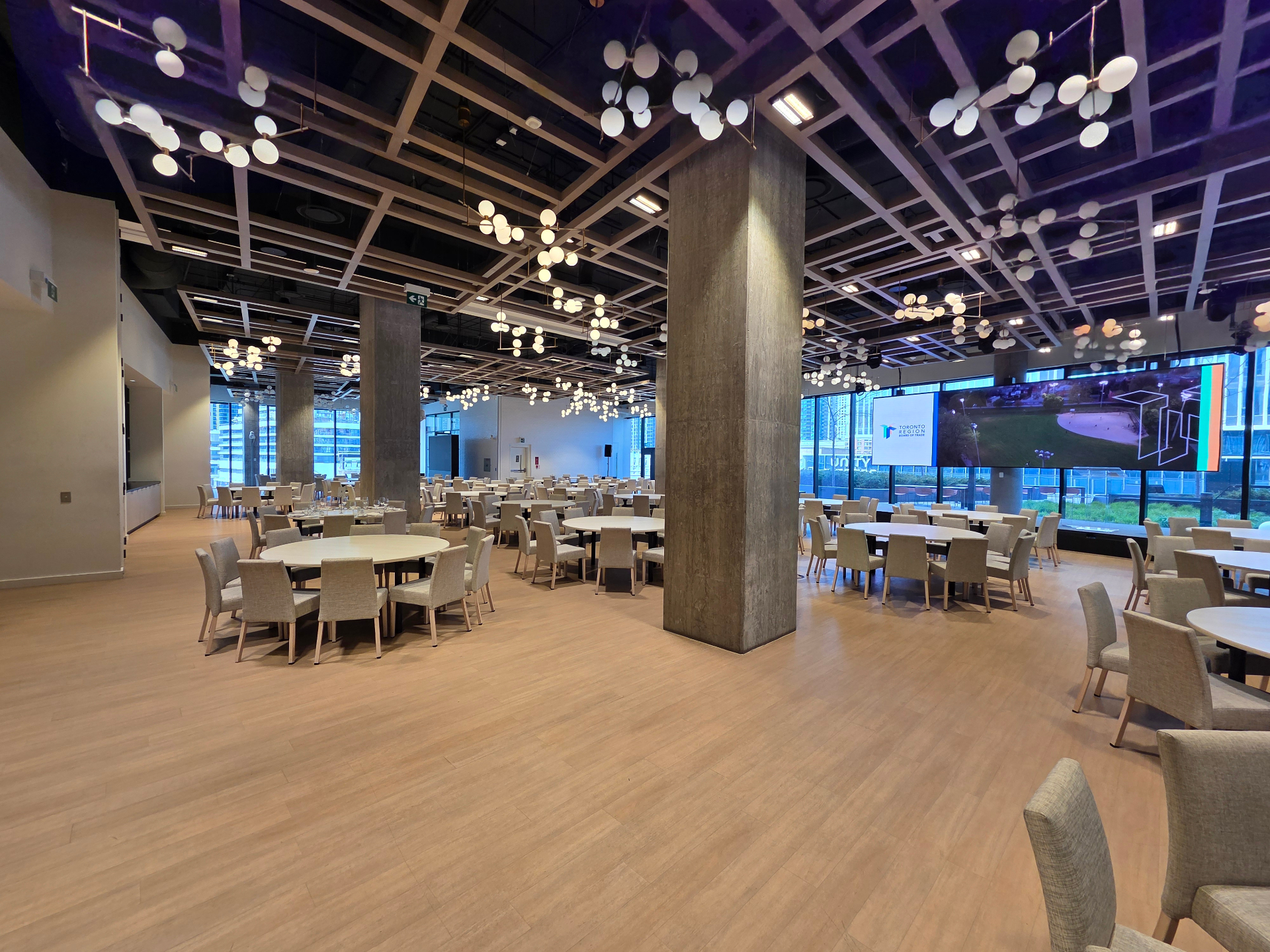 Main hall with chandeliers and floor-to-ceiling windows