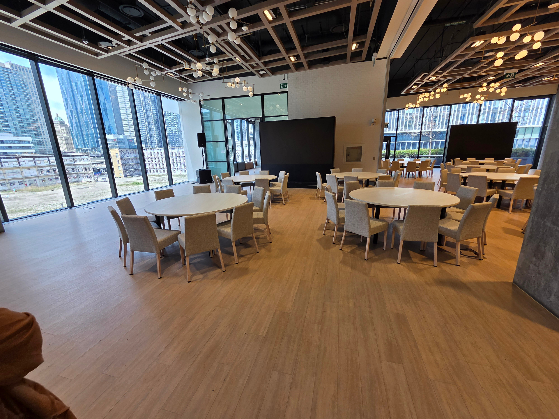 Floor-to-ceiling skyline view from the venue
